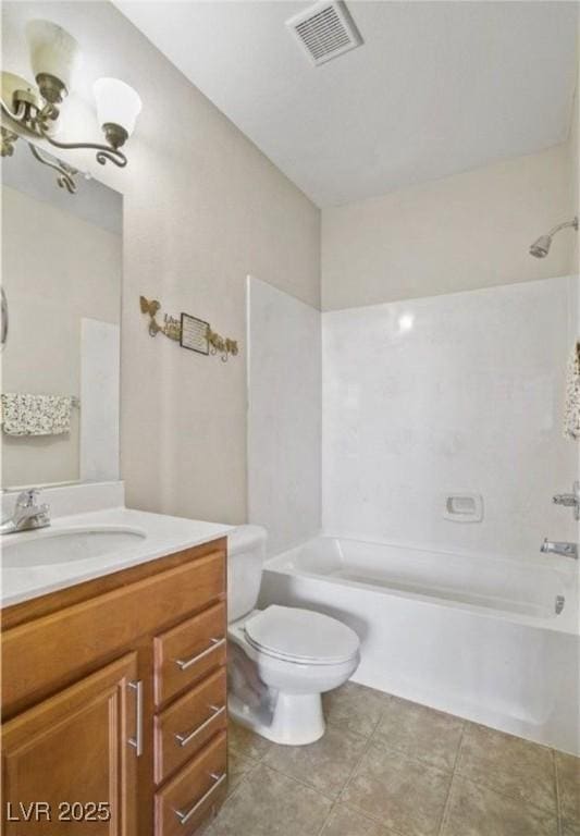 full bathroom with tile patterned floors, vanity, toilet, and shower / bath combination