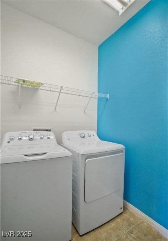 laundry room with washer and dryer