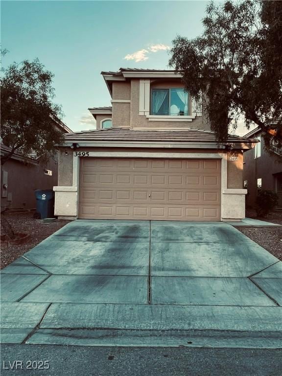 view of property with a garage