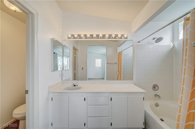 full bathroom with shower / bath combination with curtain, vanity, and toilet