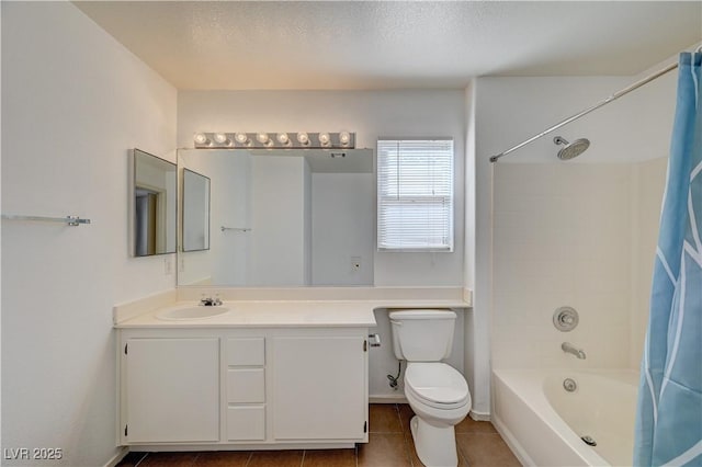 full bathroom featuring shower / tub combo, tile patterned flooring, vanity, a textured ceiling, and toilet