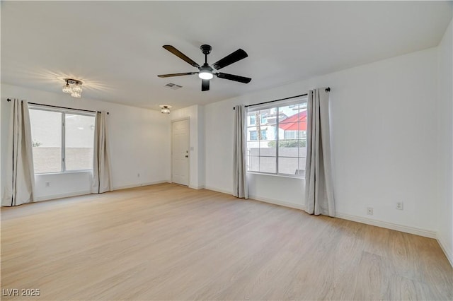 unfurnished room with ceiling fan and light hardwood / wood-style floors