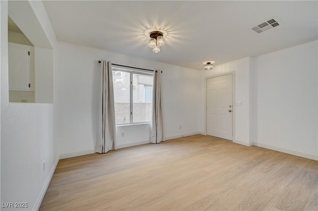 empty room featuring light wood-type flooring