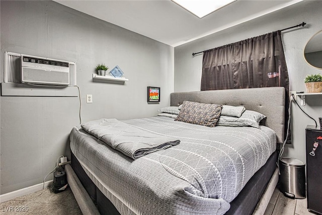 bedroom with a wall mounted air conditioner