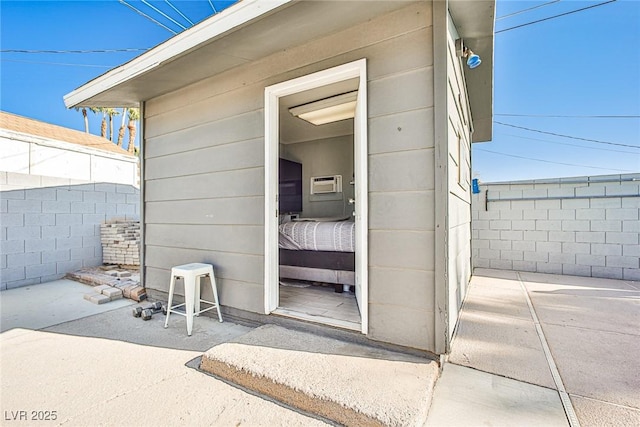 property entrance with a patio