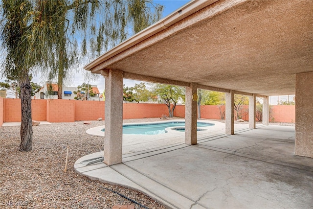 view of patio / terrace featuring a fenced in pool