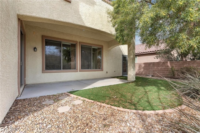 rear view of property with a patio area