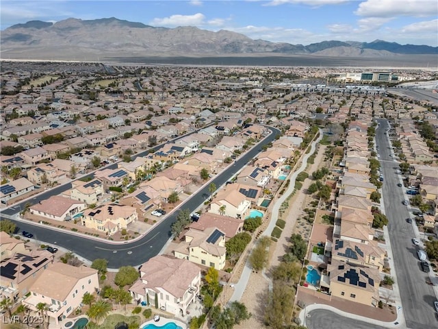 drone / aerial view featuring a mountain view