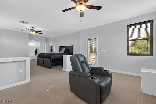 bedroom featuring ceiling fan and light carpet