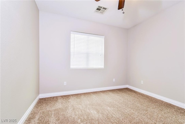 unfurnished room featuring carpet and ceiling fan