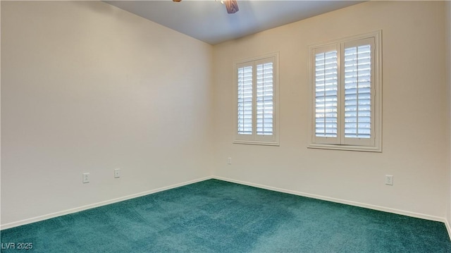 carpeted empty room with ceiling fan