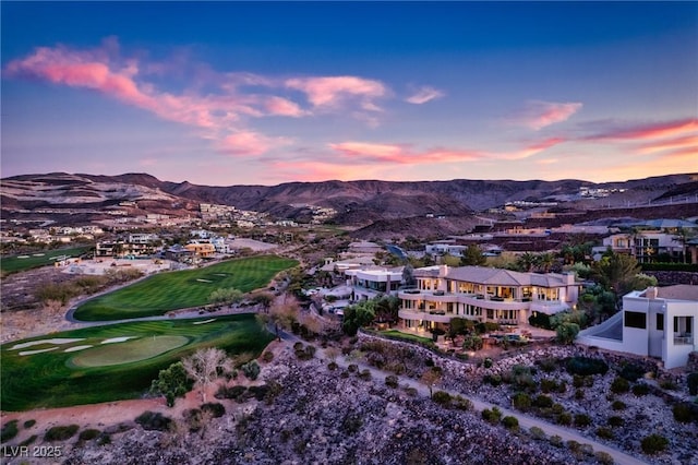 aerial view at dusk with a mountain view