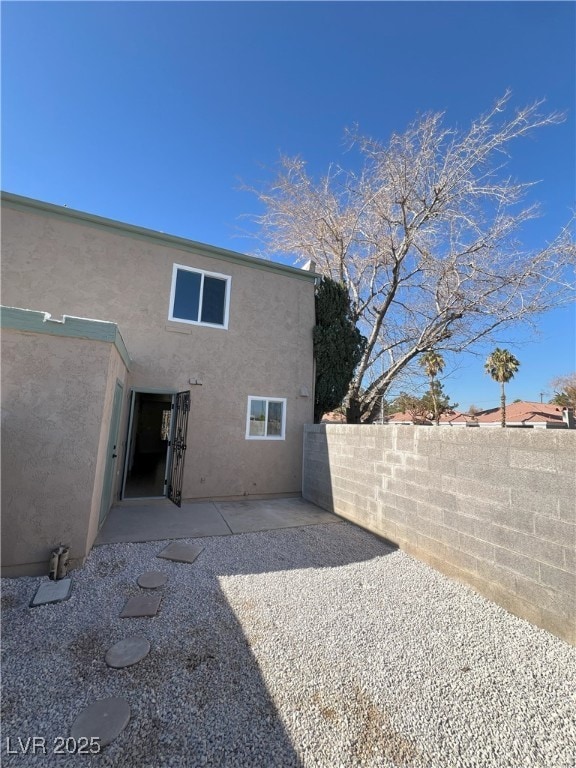 rear view of property with a patio