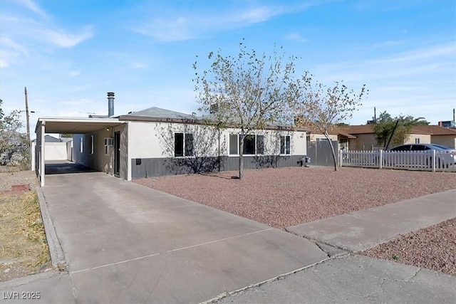 view of front of home with a carport