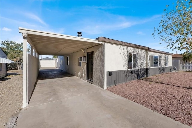 view of front facade with a carport