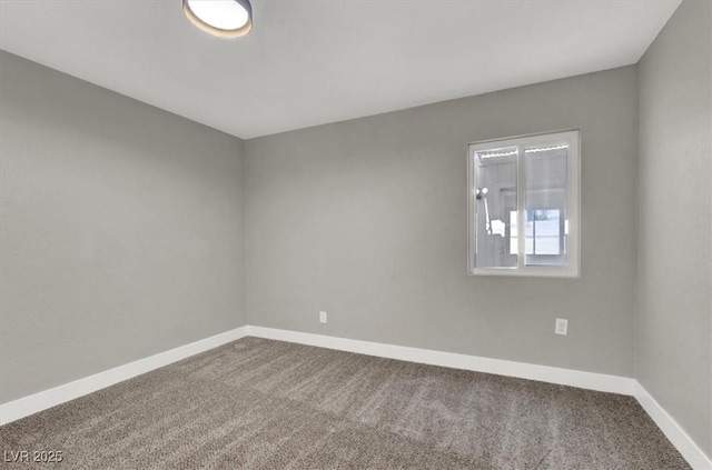 unfurnished room featuring carpet floors