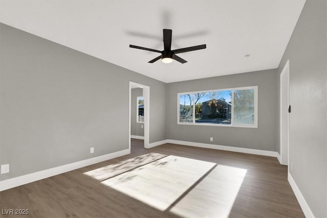 interior space featuring dark hardwood / wood-style floors and ceiling fan