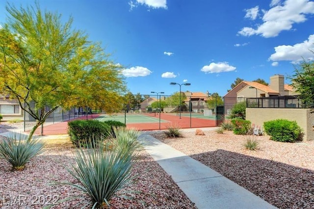 view of basketball court with tennis court