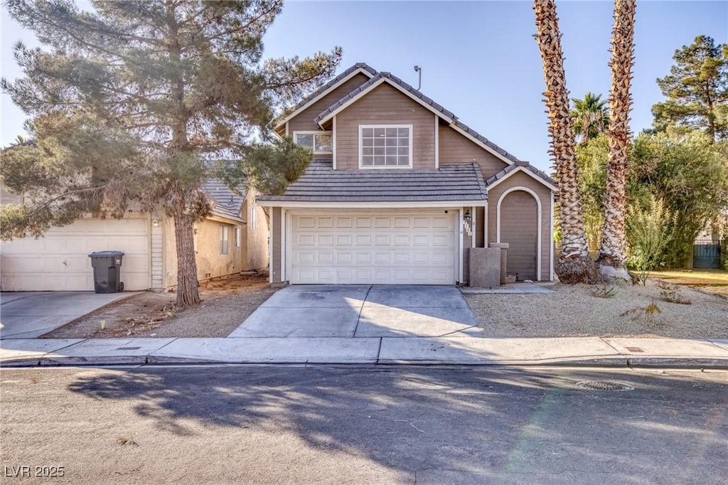 view of front of property with a garage