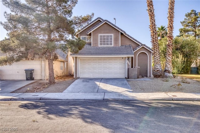 view of front of property with a garage