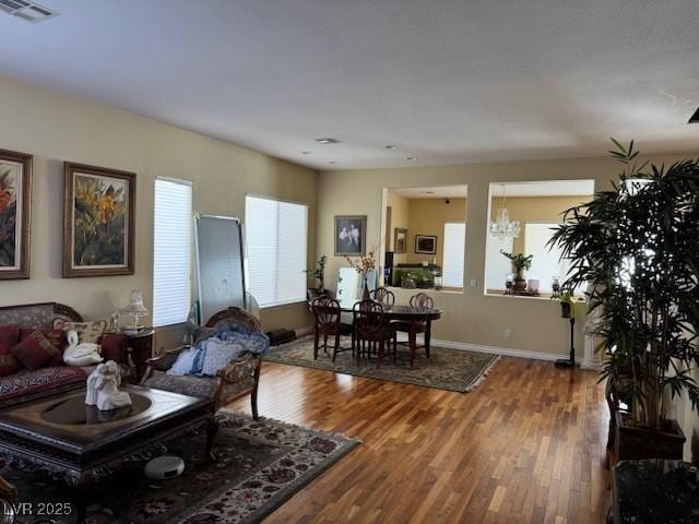 living room featuring a healthy amount of sunlight and wood-type flooring