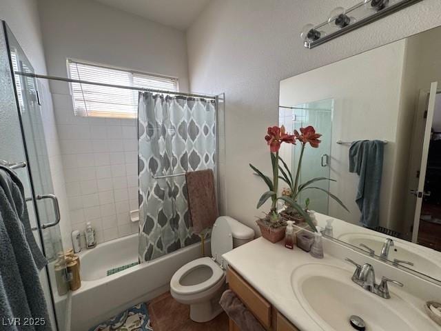 full bathroom featuring vanity, toilet, and shower / tub combo