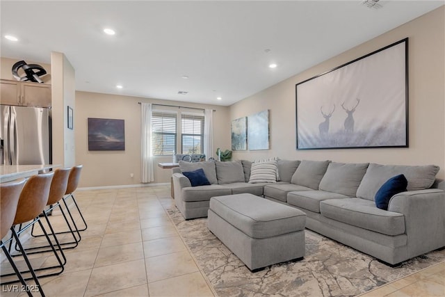 living room featuring light tile patterned flooring