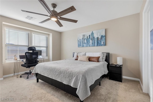 bedroom with light colored carpet and ceiling fan