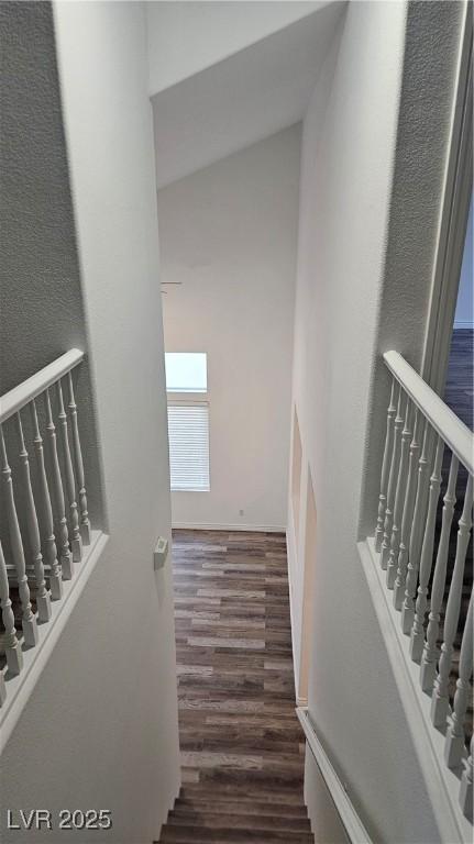 stairs with wood finished floors