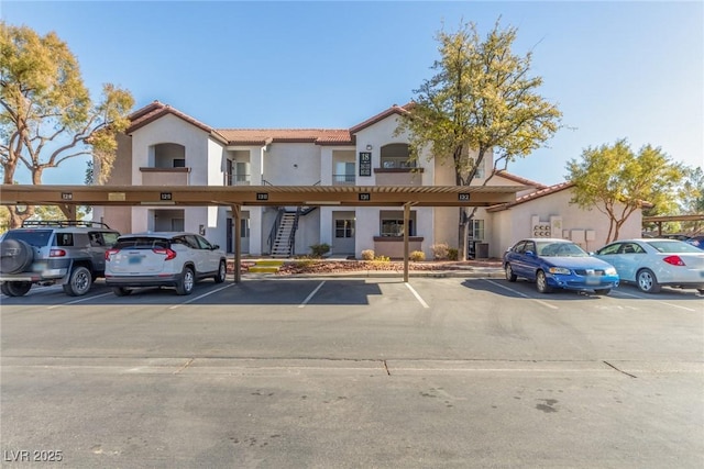 view of front of property with a carport