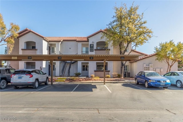 view of front of property with a carport