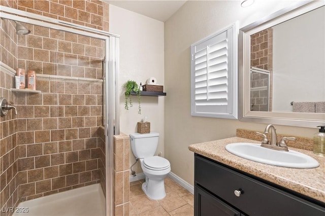 bathroom with vanity, toilet, a stall shower, and tile patterned flooring