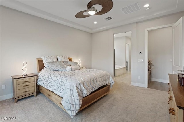 carpeted bedroom featuring ceiling fan and ensuite bathroom