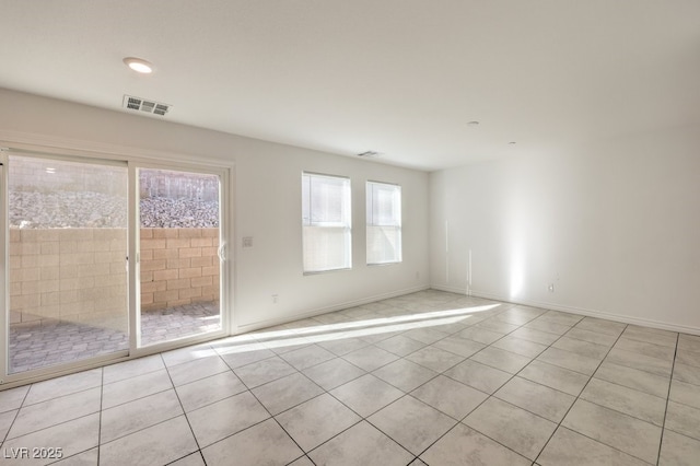 view of tiled spare room