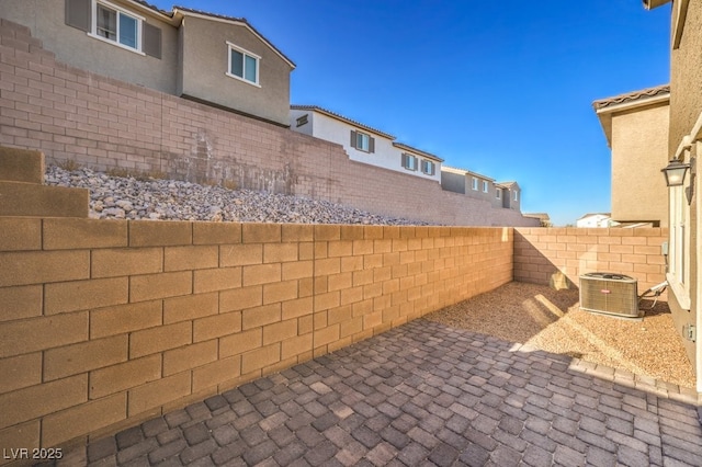 view of patio / terrace with central AC unit