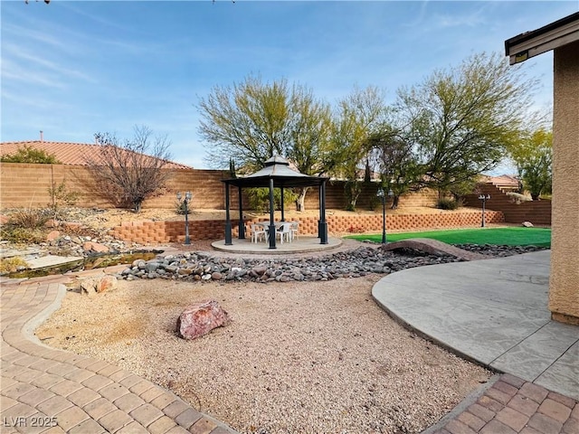 view of yard with a gazebo and a patio area