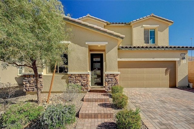 view of front of property featuring a garage