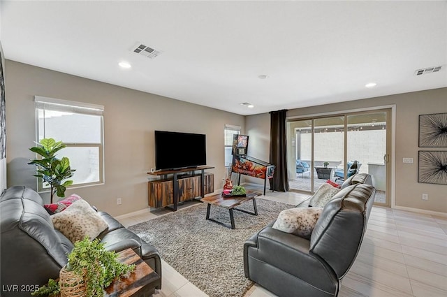 living room featuring light tile patterned flooring