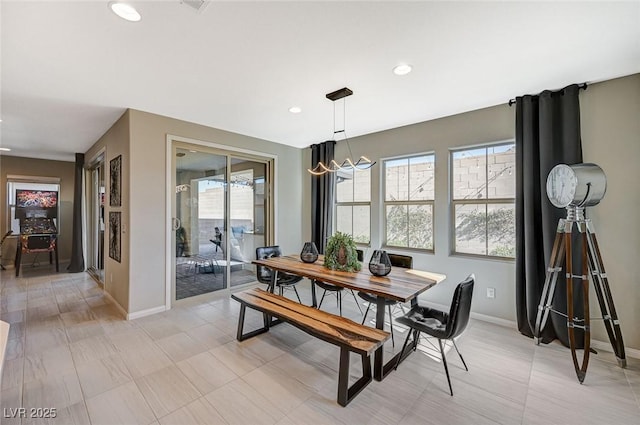 dining room featuring plenty of natural light