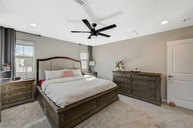 carpeted bedroom with ceiling fan