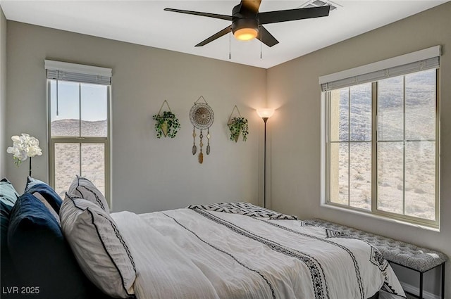 bedroom featuring ceiling fan