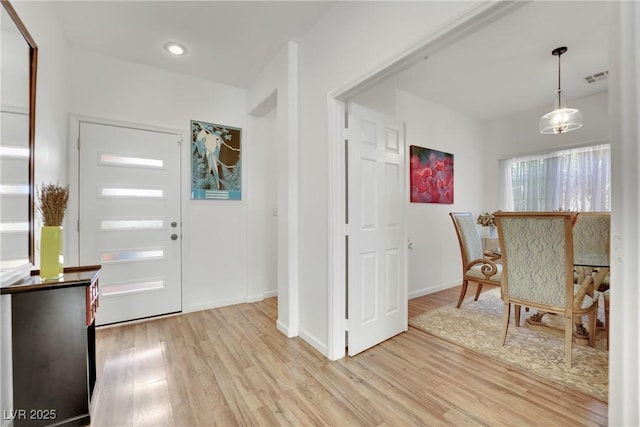 entrance foyer featuring light hardwood / wood-style floors