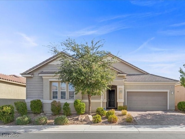 view of front of property with a garage