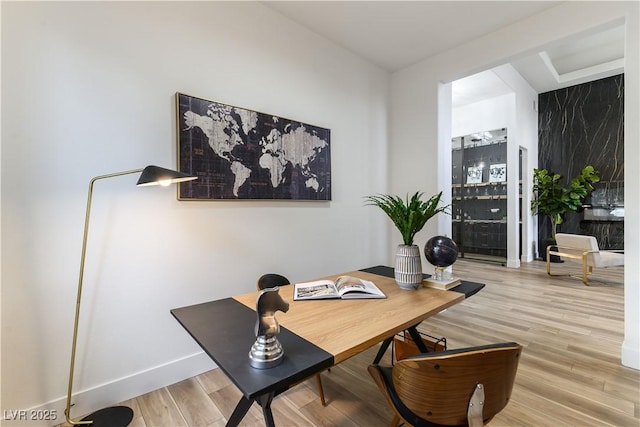 office area with wood-type flooring