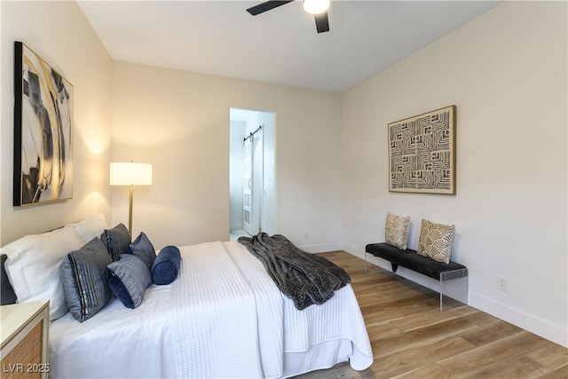 bedroom featuring ceiling fan and hardwood / wood-style floors