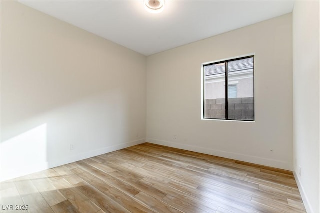 unfurnished room featuring light hardwood / wood-style floors