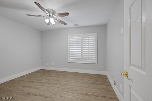 empty room featuring light hardwood / wood-style floors and ceiling fan