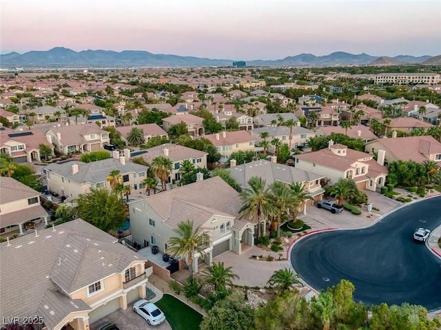 aerial view at dusk with a mountain view