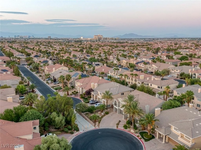 aerial view at dusk with a mountain view