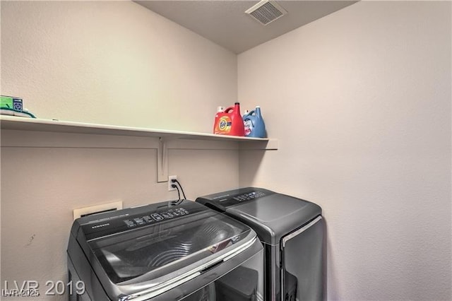 laundry area featuring washer and dryer